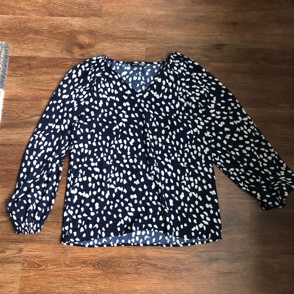 Blue and white polka dot blouse